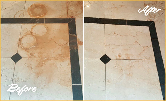 Before and After Picture of a Willards Hard Surface Restoration Service on a Marble Floor to Eliminate Rust Stains